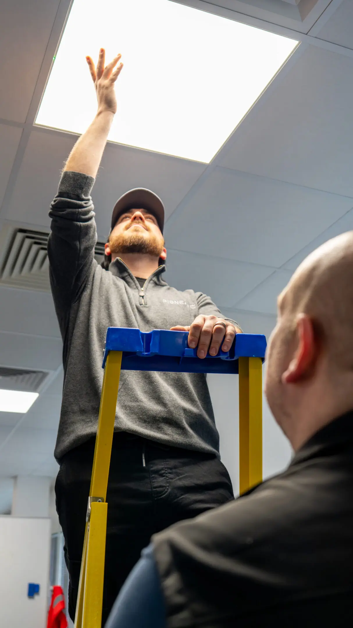 Facilities engineer carrying out safety inspection as part of planned preventative maintenance programme