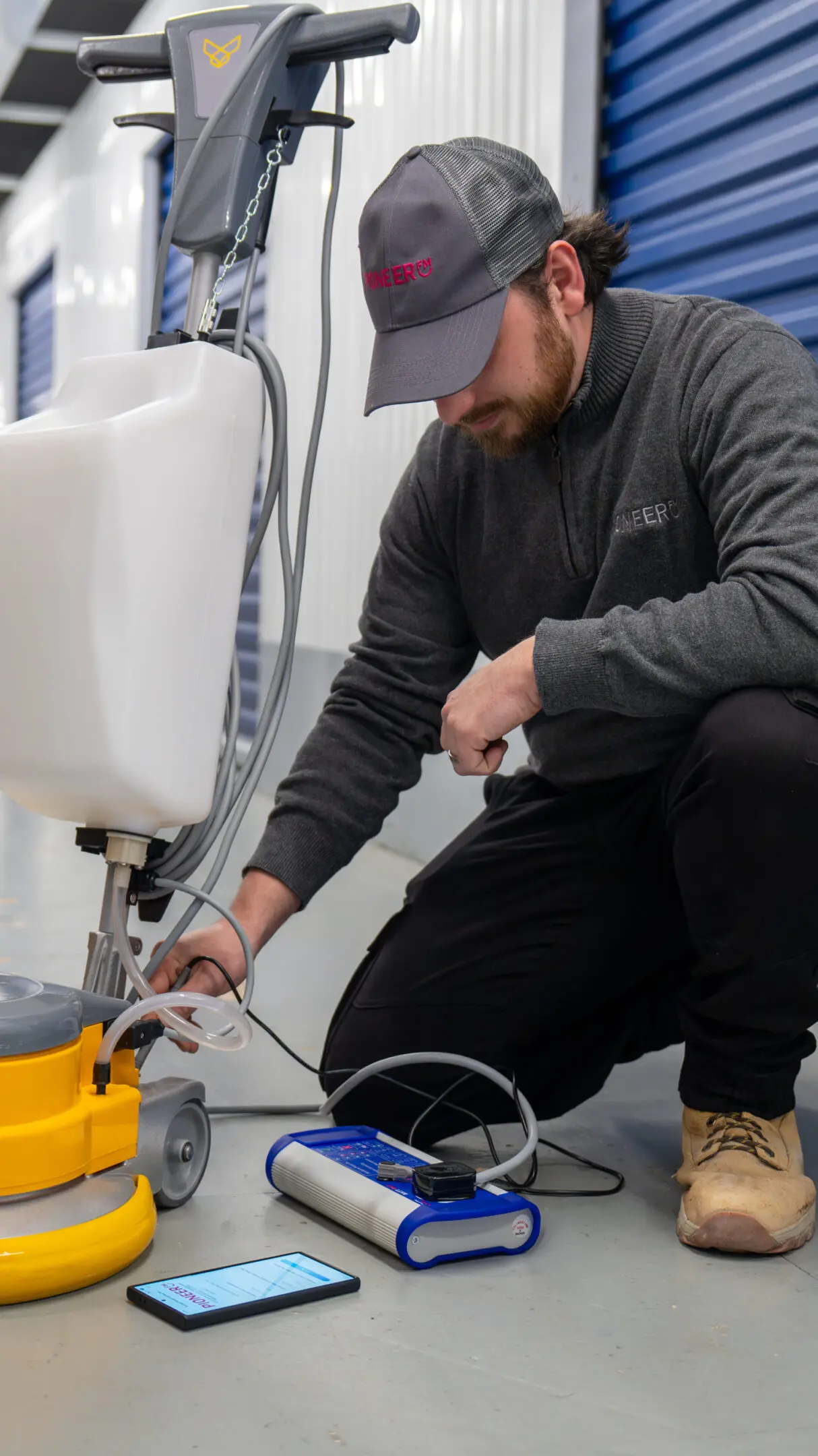 Commercial floor cleaning machine testing in UK workplace environment