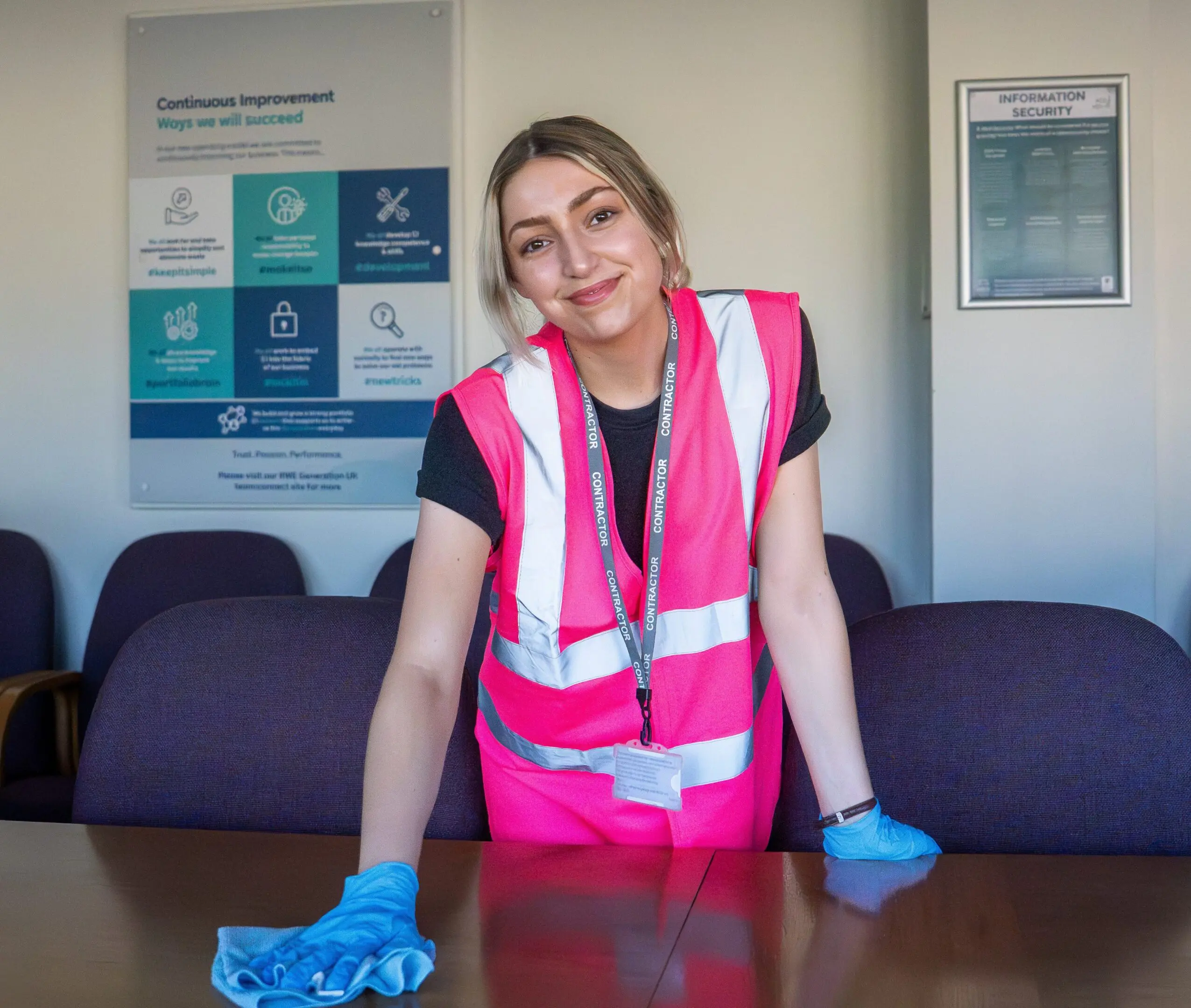 Pioneer FM cleaning operative delivering commercial cleaning services in a modern office environment