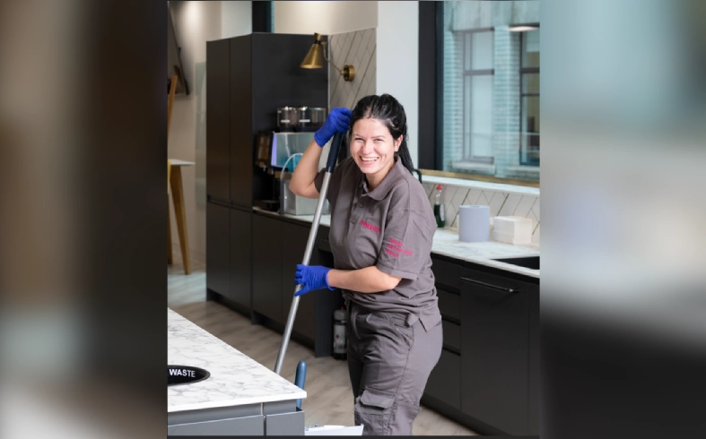 Commercial cleaner disinfecting office desk – Pioneer FM UK