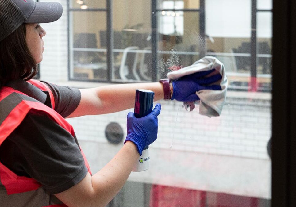 Modern commercial window cleaning using advanced equipment in the UK cleaning industry